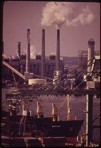 Boston Harbor - Seen from the Top of Mystic River Bridge. In Foreground, Massachusetts Port Authority Shipping Facility Has New Equipment That Permits Direct Loading from Ship to Freight Train. Original public domain image from Flickr