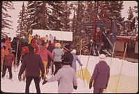 Boarding the Cloud 9 Chairlift at the Aspen Highland Ski Area, the Highest Ski Slope at Aspen.  Original public domain image from Flickr