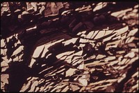 Close-Up of Slatey Rock Chips in the Atigun Gorge, 5 Miles East of the Pipeline Crossing of the Atigun River. These Chips, Here About One-Half Inch Long, Are Gradually Being Weathered Down by Frost Wind and Water Into Soil. Original public domain image from Flickr