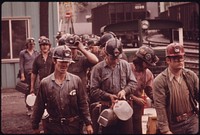 Miners Line Up to Go Into the Elevator Shaft at the Virginia-Pocahontas Coal Company Mine #4 near Richlands, Virginia the Man at the Right Wears a Red Hat Which Means He Is a New Miner and Has Worked Below Less Than a Month.