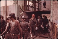 First Shift of Miners at the Virginia-Pocahontas Coal Company Mine #4 near Richlands, Virginia, Leaving the Elevator 04/1974. Photographer: Corn, Jack. Original public domain image from Flickr