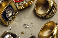 Recently confiscated counterfeit Super Bowl rings lay on a table at a U.S. Customs and Border Protection Office of Field Operations facility in Minneapolis, Minn., Jan. 31, 2018.