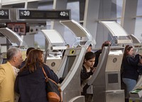 U.S. Customs and Border Protection, Office of Field Operations, officers conduct standard arrival screening operations at Miami International Airport in Miami, Florida, Jan. 10, 2018.
