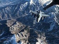 A U.S. Air Force F-16 Fighting Falcon receives fuel from a KC-135 Stratotanker assigned to the 340th Expeditionary Air Refueling Squadron Detachment 1 during a refueling mission over Afghanistan, Jan. 25, 2018.