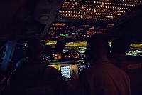 Pilot cockpit window, night light. Original public domain image from Flickr