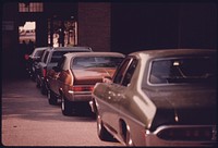 Motorists in Line at the Safety Lane at an Auto Emission Inspection Station in Downtown Cincinnati, Ohio. Safety Inspection of All Vehicles Began in 1940 and Was Made on a Semi-Annual Basis until January, 1975, When They Became an Annual Event.