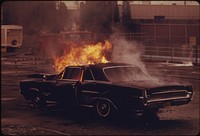 Actual Demonstration by the Fire Department Training Station Showing What Would Happen after a Rear End Accident If a Five Gallon Can of Gasoline Was Carried in the Trunk of an Auto. Photographer: Falconer, David. Original public domain image from Flickr