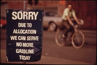 Oregon Still Had Scattered Gasoline Problems in May, 1974. A Downtown Station in Portland Shows a Sign Saying the Day's Allocation Is Sold Out. A Bicycler Uses an Alternate Method of Transportation 05/1974. Photographer: Falconer, David. Original public domain image from Flickr