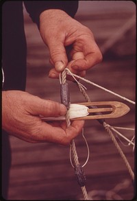 Fisherman Mends a Net at St. Helens on the Columbia River 04/1973. Photographer: Falconer, David. Original public domain image from Flickr