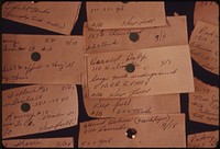 When the Major Home Oil Dealer Ran Out of Fuel a Special Board Was Activated for Emergency Deliveries. More Than 250 Homes Were without Oil. Closeup of Cards on the Wall Listed Priorities 10/1973. Photographer: Falconer, David. Original public domain image from Flickr