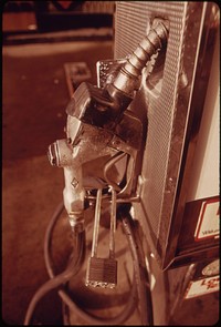 The Driving Public Became So Desperate for Gasoline That Many Stations Such as This One in Portland Had to Resort to Locking Their Pumps in Daytime During the Fuel Crisis of 1973-74 12/1973. Photographer: Falconer, David. Original public domain image from Flickr