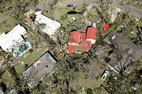 A U.S. Customs and Border Protection Air and Marine Operations UH-60 Black Hawk flight crew conducts a rescue operation to evacuate a couple from their damaged home in the aftermath of Hurricane Michael that left a swath of destruction across the area near Panama City, Florida, October 11, 2018.