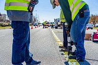 Traffic delineator installation at Charles Blvd and Smythewick Dr, part of the City's effort to improve traffic safety. November 21, 2018.