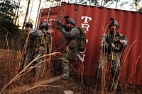 U.S. Soldiers conduct a mission during exercise Emerald Warrior 11 at Fort Walton Beach, Fla., March 11, 2010.