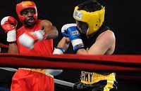 During his preliminary bout, U.S. Marine Cpl. Jamel Herring lands a left hook on U.S. Army Spc. Dustin Lara at the 2010 Armed Forces Boxing Championship on April 20, 2010 at Port Hueneme, Calif.