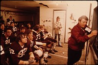 Pregame Discussion by the Coach for Cathedral Senior High School Football Players Prior to a Game at Johnson Park in New Ulm Minnesota.