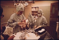 Dr. Ann Vogel Holding a Child She Has Just Delivered in Loretto Hospital in New Ulm, Minnesota.