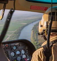 A CBP Air and Marine Operations aircrew works to locate a group of eight aliens who illegally entered the U.S. in the vicinity of Los Ebanos, Texas, June 16, 2019.