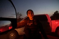 A U.S. Border Patrol agent points in the direction of travel by illegal alien shortly after he arrived on U.S. soli when he crossed the Rio Grande near Eagle Pass, Texas, June 20, 2019.