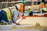 Construction crews make final preparations before Reade Circle and Cotanche Street open later in the week, Town Creek Culvert, February 10, 2020. Original public domain image from Flickr