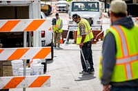 Construction crews make final preparations before Reade Circle and Cotanche Street open later in the week, Town Creek Culvert, February 10, 2020. Original public domain image from Flickr