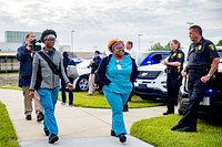 Greenville Fire/Rescue, and Vidant Police gathered to cheer on employees, Vidant Medical Center, date unknown. Photo by Aaron Hines. Original public domain image from Flickr