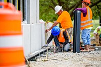 Installation of stainless steel cladding and lighting begins on the Sycamore Hill Gateway Plaza, May 4, 2020. Original public domain image from Flickr