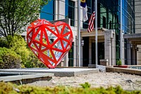 City Hall heART workOn Monday, May 4, 2020, Greenville, NC Public Works crews installed new sculpture at City Hall as part of the DownEast Sculpture Exhibition administered by the Pitt County Arts Council at Emerge Gallery and Art Center. This sculpture, called “Low-Poly Open Heart (REDI),” was created by Matthew Duffy of Washington, DC. For more information, please visit pittcountyarts.org/