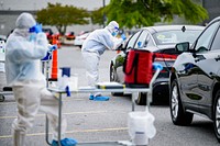 COVID-19 at the drive-thru test center at WalMart on Greenville Boulevard on Wednesday, May 13, 2022, North Carolina, photo by Aaron Hines. Original public domain image from Flickr