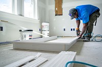 Interior doorway trim is constructed and installed in a home undergoing rehabilitation through the City of Greenville's Housing Division programs. May 1, 2020. Original public domain image from Flickr