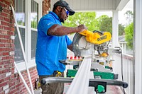 Interior doorway trim is constructed and installed in a home undergoing rehabilitation through the City of Greenville's Housing Division programs. May 1, 2020. Original public domain image from Flickr