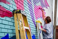 ArtLab Mural by artist Scotte Eagle, volunteers assist with painting a new mural, November 6, 2020, photo by Aaron Hines / City of Greenville. Original public domain image from Flickr