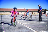 Bicycle Rodeo (Nov 2020)Greenville PD's Police Athletic League (PAL), GPD's Traffic Safety Unit, and Love A Sea Turtle teamed up to host a Bicycle Rodeo on Saturday, November 21. Participants without their own bicycle were able to have a new helmet fitted, chose a bicycle, and take it home with them after the event. Riders were taught how to safely ride a bicycle, use hand signals, and were able work on their riding skills on the safety course. Bicycles were provided by Love A Sea Turtle's Cyclast program, which repairs and refurbishes used bikes to give to families in need through events like the Bicycle Rodeo. Photo by Aaron Hines/City of Greenville.