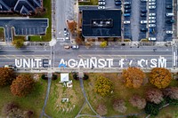 Artists began masking and painting mural letters, December 11, 2020, North Carolina, USA. Original public domain image from Flickr