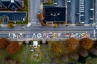 Artists continue painting the 1st Street Mural, December 12, 2020, North Carolina, USA. Original public domain image from Flickr