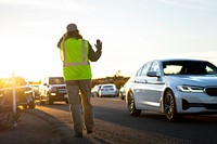 Park volunteer directing traffic