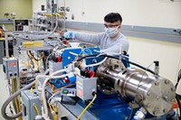 Scientist wearing mask in engine labs. Argonne National Laboratory, October 16, 2020. Original public domain image from Flickr