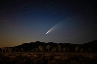 Comet in dark sky