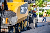Construction crews lay down new layers of asphalt along Reade Circle as the work near the Evans Street intersection nears completion. July 17, 2020. Original public domain image from Flickr