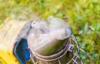 Bee smoker, beekeeper equipment. Original public domain image from Flickr