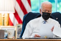 President Joe Biden looks over his notes in the Oval Office of the White House Thursday, July 29, 2021, prior to signing the Dispose Unused Medications and Prescription Opioids Act and the Major Medial Facility Authorization Act of 2021. (Official White House Photo by Adam Schultz). Original public domain image from Flickr