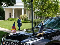 President Joe Biden walks from the Oval Office of the White House to the Presidential limousine on the South Lawn driveway Tuesday, July 27, 2021, as he departs en route to the ODNI Headquarters in Tysons Corner, Virginia. (Official White House Photo by Adam Schultz). Original public domain image from Flickr