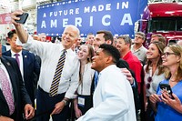 President Joe Biden takes a selfie with guests following his remarks on Wednesday, July 28, 2021, at the Mack-Lehigh Valley Operations Manufacturing Facility in Macungie, Pennsylvania. (Official White House Photo by Adam Schultz). Original public domain image from Flickr