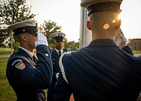 Members of the United States Coast Guard Ceremonial Honor Guard prepare for a flag raising ceremony at the Department of Homeland Security headquarters in Washington, D.C., September 14, 2021. Original public domain image from Flickr