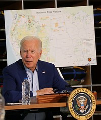 President Visit to NIFC. On September 21, 2021, President Joe Biden visited the National Interagency Fire Center in Boise, Idaho to meet with fire managers and then traveled to California to survey the damage from recent wildfires. The White House is focused on our response to severe wildfires, and how we can make our nation more resilient to climate change and extreme weather. Photo by Jessica Gardetto, BLM. Original public domain image from Flickr