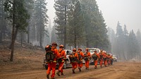 Firefighters at the Dixie Fire, Lassen National Forest, California. Original public domain image from Flickr