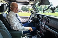 President Joe Biden drives a Jeep Wrangler Rubicon during a clean cars event, Thursday, August 5, 2021. (Official White House Photo by Adam Schultz). Original public domain image from Flickr