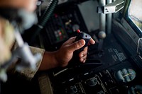 Helicopter joystick, pilot cockpit. Original public domain image from Flickr