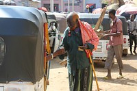 Old man on the street. Original public domain image from Flickr