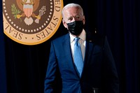 President Joe Biden arrives to deliver remarks on the FDA’s full approval of the Pfizer COVID-19 vaccine, Monday, Aug. 23, 2021, in the South Court Auditorium in the Eisenhower Executive Office Building at the White House. (Official White House Photo by Erin Scott). Original public domain image from Flickr